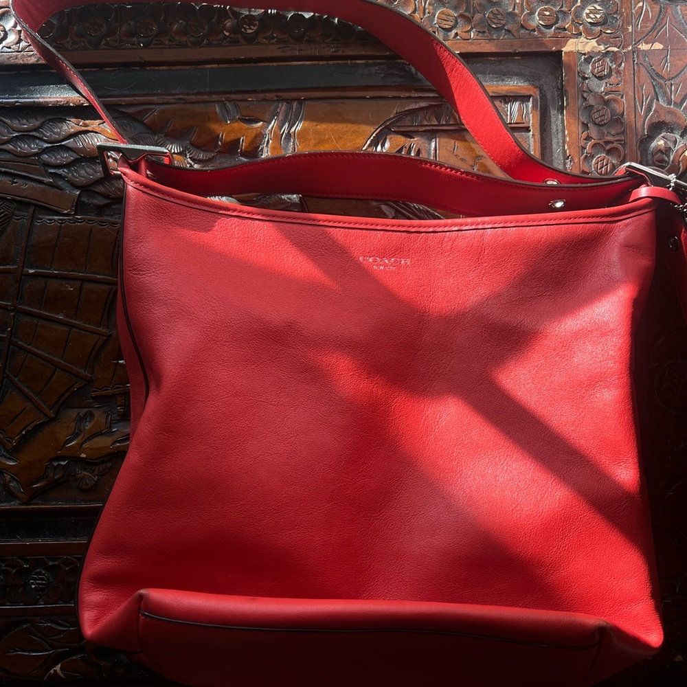 Coach Legacy Leather duffle in burnt orange made in 2012.